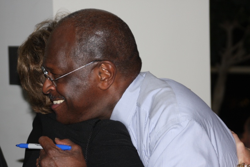 Lisa_Blake_gets_a_Herman_Cain_hug