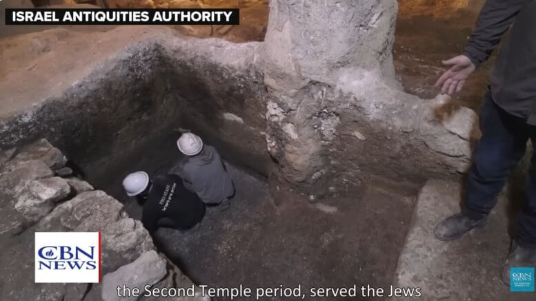 Ancient mikvah ritual bath beneath Western Wall Plaza in Jerusalem with ash from 70 AD Roman destruction