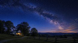 Milky Way over rural Virginia farmhouse at twilight