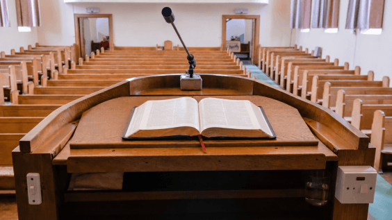 An open Bible on a pulpit — the most political book on earth